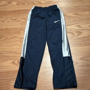 Size 6 Nike pants- blue with silver stripes. Athletic pants